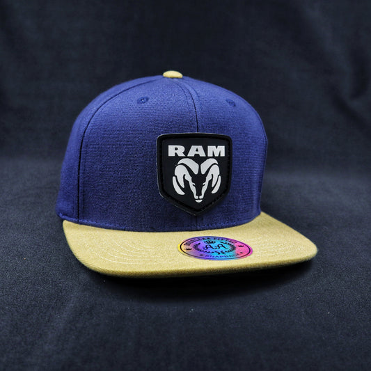 Pack | Snapback RAM Azul-Amarillo + Lente Wayfarer Black Polarizado